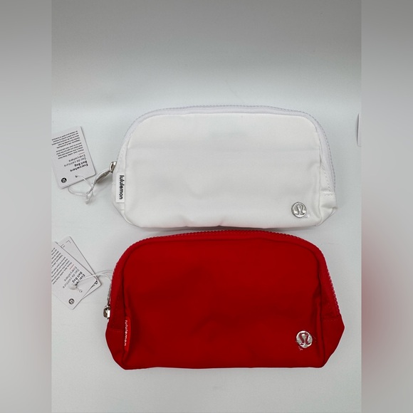 Handbags - 2 pcs NWT Lululemon Everywhere Belt Bags Red White